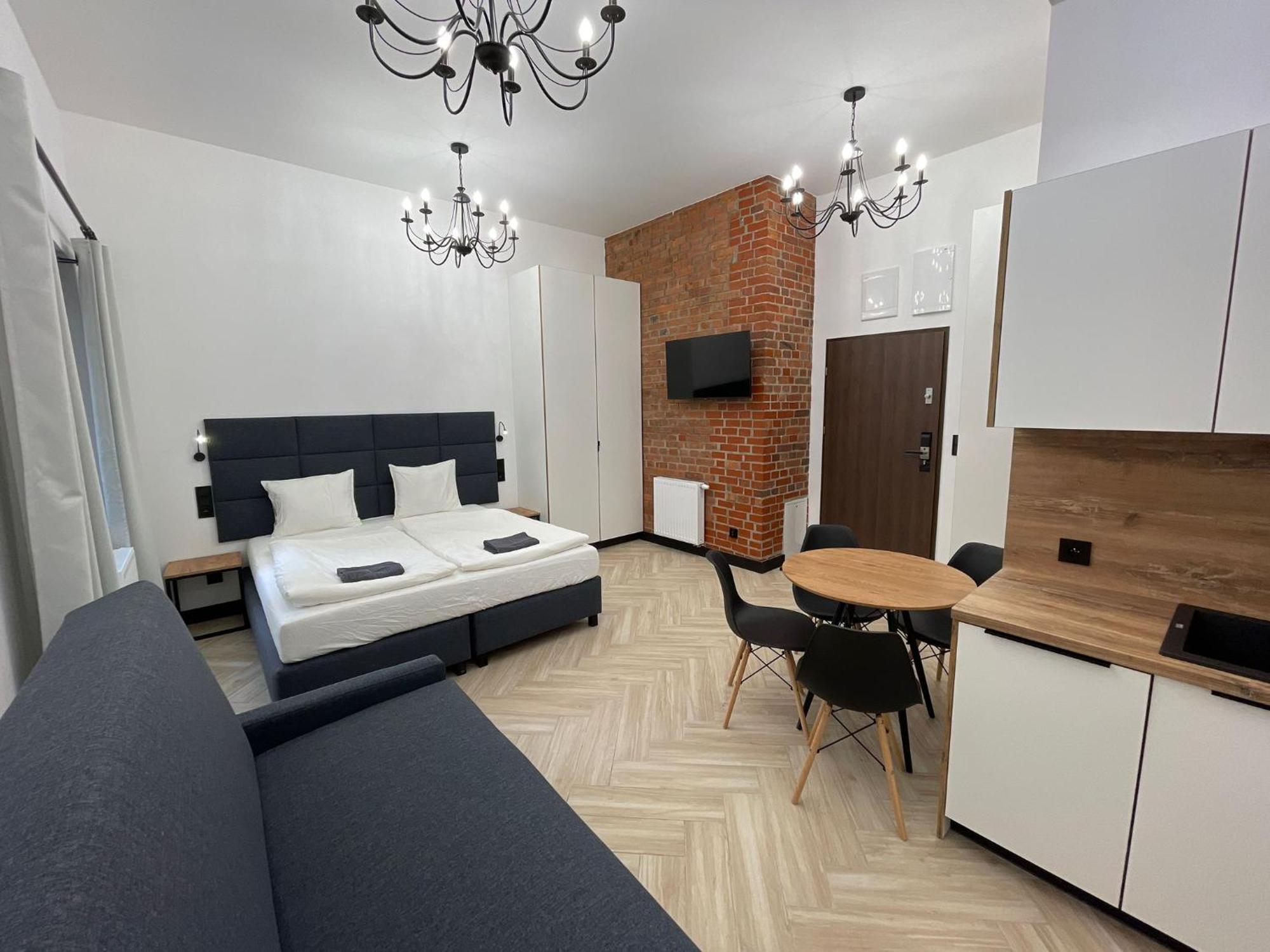 Aparthotel Pod Blekitnymi Podkowami *